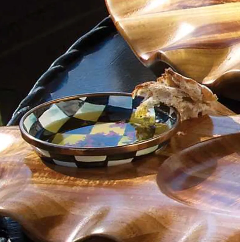 Mackenzie-Childs check bowl with olive oil and bread.