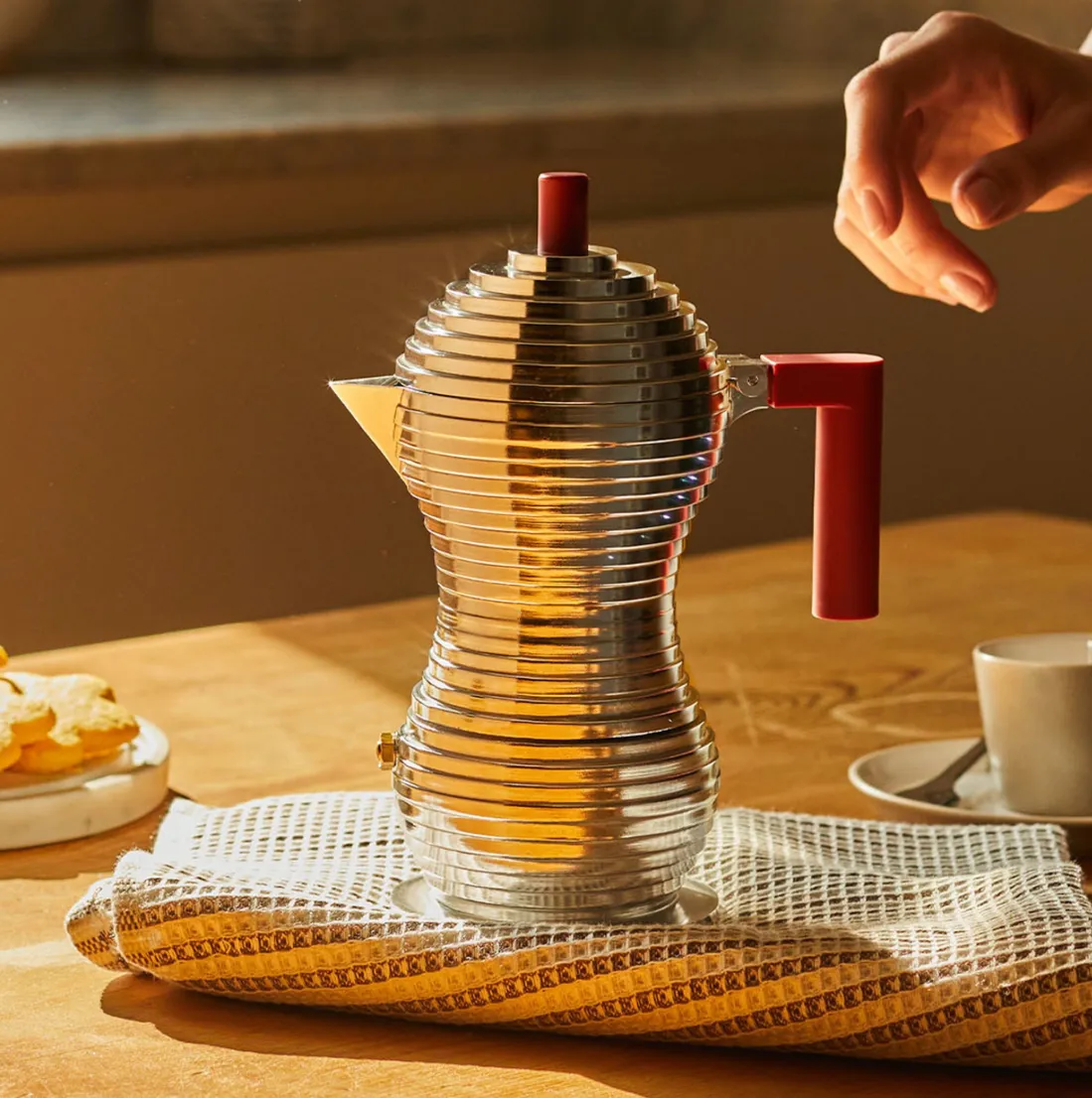 Alessi Pulcina Stovetop Pot (3 Cup) on a counter.